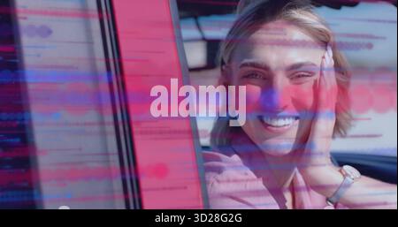 Femme blonde souriante se reposant joue sur la main dans la voiture avec montre-bracelet et graphiques de pépins, espace de copie Banque D'Images