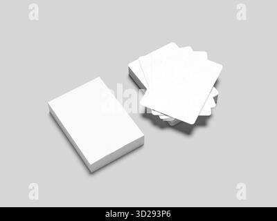 Boîte de jeu de cartes rouge détaillée à côté des cartes empilées montrant l'as de cœur sur fond Uni Banque D'Images