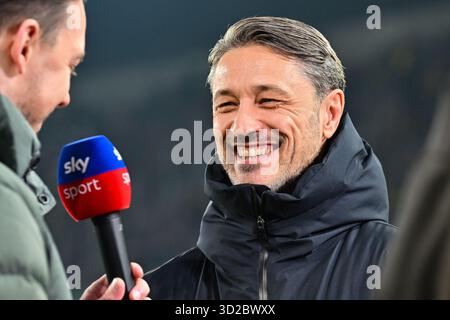 Augsburg, Deutschland. 31 octobre 2025. AUGSBOURG, ALLEMAGNE - OCTOBRE 31 : Niko KOVAC Headcoach Borussia Dortmund, interview, Sky, Happy, avant le match de bundesliga entre FC Augsburg vs Borussia Dortmund le jour 9 à la WWK Arena le 31 octobre 2025 à Augsbourg, Allemagne/DFL RÈGLEMENTATIONS INTERDISENT TOUTE UTILISATION DE PHOTOGRAPHIES COMME SÉQUENCES D'IMAGES ET/OU QUASI-VIDÉO/dpa/Alamy Live News Banque D'Images