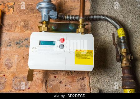 Alimentation de compteur de gaz britannique entrant dans une propriété résidentielle Banque D'Images