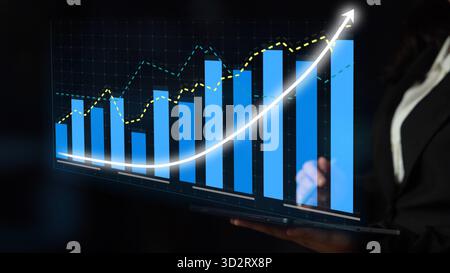 Cette image montre une visualisation de la croissance de l'entreprise avec des graphiques à barres bleues et un graphique linéaire sur un fond sombre, parfait pour l'analgésie financière Banque D'Images
