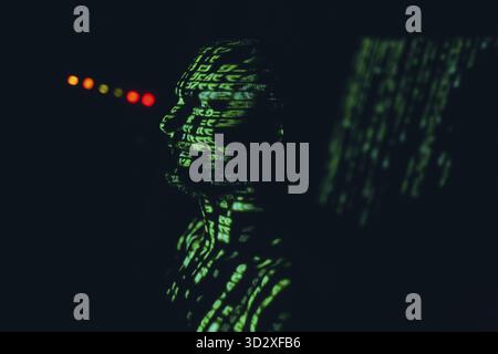 Jeune homme avec des lettres abstraites geen sur son visage dedans le noir Banque D'Images