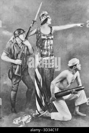 Ben Ali Haggin - portraitiste américain et scénographe. Il est connu pour ses portraits de femmes éminentes de la société et d'interprètes de théâtre, et pour la conception de tableaux vivants pour les Ziegfeld Follies de 1917 à 1925. L'image fournie est une photographie d'un tel tableau patriotique, intitulé America Answers, qui a été arrangé par Haggin. Il met en scène l'actrice Ethel Barrymore comme figure centrale représentant Liberty. Ce tableau fait partie d'une série utilisée pour la propagande ou les efforts de collecte de fonds, comme le concours national de la Croix-Rouge en 1917 et Liberty Loan Banque D'Images