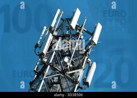 Mât de téléphone portable moderne avec des billets en euros en arrière-plan Banque D'Images