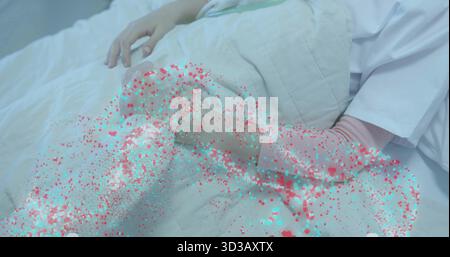 Mère couchée et fille reposant sous couette beige dans la chambre à coucher de la maison, avec confettis numériques flottant Banque D'Images