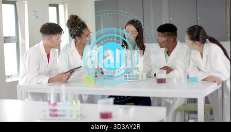 Mentor et étudiants portant des blouses de laboratoire et des lunettes menant des expériences dans le laboratoire de l'école, avec tablette Banque D'Images