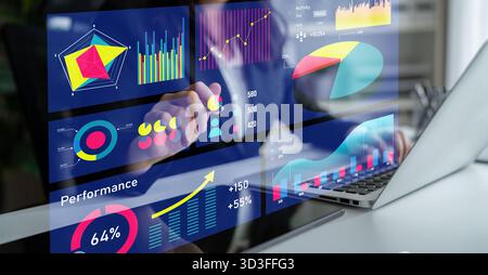 Un professionnel de l'entreprise s'engage avec des graphiques et des graphiques de visualisation de données sur un ordinateur portable à écran tactile, présentant l'analyse et les mesures de performance dans un Banque D'Images