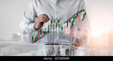 Un homme d'affaires effectue une analyse boursière en utilisant des graphiques et des graphiques numériques. Sur fond de bureau moderne, cette image met en valeur les aspects financiers Banque D'Images