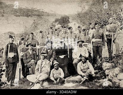 Photographie prise en 1902 sur l'île de Sainte-Hélène, montrant le général Cronjé et son entourage pendant la guerre des Boers. La photo montre son secrétaire, le général Cronjé, sa femme, son neveu et le chef de son état-major, avec des soldats debout à proximité. Ils gardaient des prisonniers Boer dans le camp de Deadwood. Banque D'Images