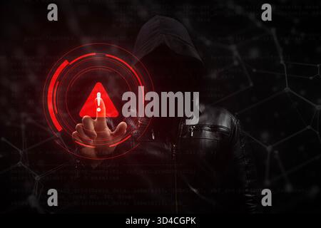 Gros plan sur un homme hacker à capuche sans visage dans l'ombre touchant un signal d'avertissement avec concept netweb gris Banque D'Images