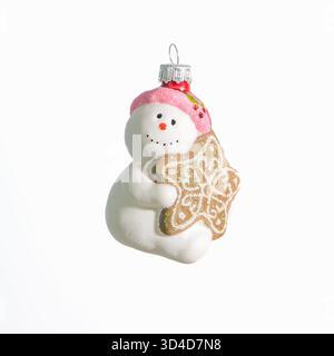 Jouet d'arbre de Noël en verre sous la forme d'un bonhomme de neige joyeux. Style rétro Banque D'Images