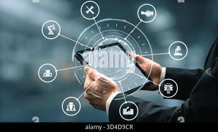 Automatisation industrielle mécanisée et système de production moderne avec bras robotisés, engrenages, outils et logistique pour un processus industriel mécanisé efficace Banque D'Images