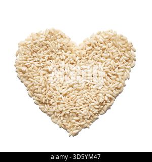 Un tas de riz en forme de cœur, symbolisant l'amour, l'unité et l'espoir. Les céréales, diversifiées et saines, reflètent la solidarité mondiale. Soins, santé et nutrition Banque D'Images
