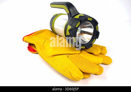 gants de travail et lampe de poche de travail Banque D'Images