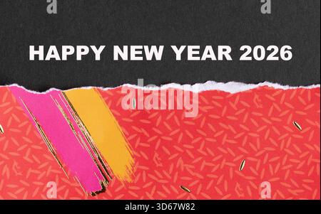 Bonne année 2026 sur la surface de papier rouge sombre et coloré. Banque D'Images