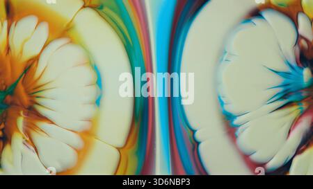 Art fluide lumineux présentant des motifs colorés vibrants symétriques Banque D'Images