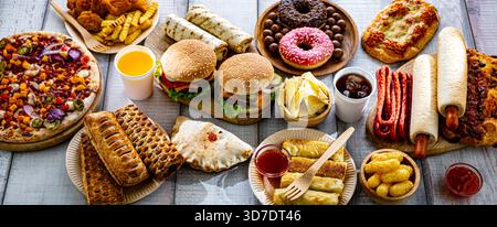 Aliments augmentant le risque de cancer. Malbouffe. Banque D'Images