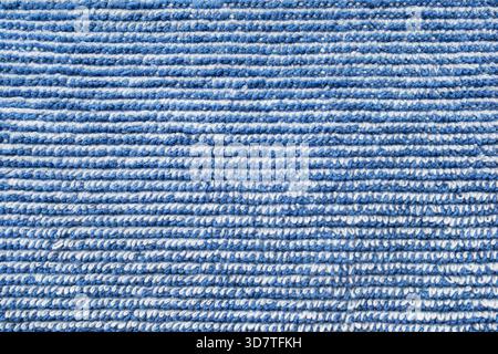 Tissu de fibre éponge rayé bleu et blanc gros plan comme arrière-plan Banque D'Images