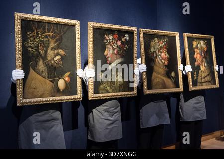 Londres, Angleterre, Royaume-Uni. 27 novembre 2025. Les membres du personnel détiennent ''The four Seasons'' par l'atelier de Giuseppe Arcimboldo (Milan 1527-1593), estimation : â£800 000 '' 1 200 000 lors d'un appel photo à la maison de vente aux enchères Christie's avant Classic week Sales. (Crédit image : © Wiktor Szymanowicz/ZUMA Press Wire) USAGE ÉDITORIAL SEULEMENT ! Non destiné à UN USAGE commercial ! Banque D'Images