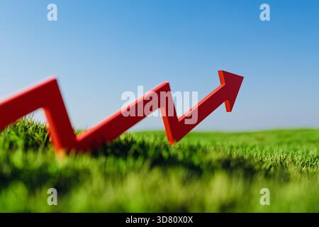 Red Arrow Rising on Green Grass Growth Success concept Copy Space.3D. Banque D'Images