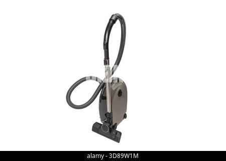 Aspirateur à cartouche grise avec tuyau et baguette télescopique debout. Appareil complet isolé sur fond blanc pour la présentation du produit. Banque D'Images