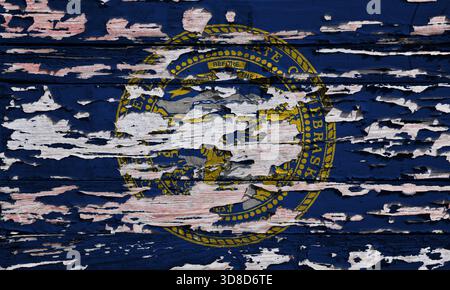 Drapeau du Nebraska peint sur une planche de bois grunge. Banque D'Images