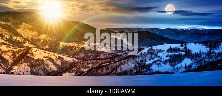 panorama avec des collines boisées enneigées sur le solstice d'hiver. concept de changement de jour et de nuit. paysage de crête de montagne avec des sommets recouverts de neige lointains Banque D'Images