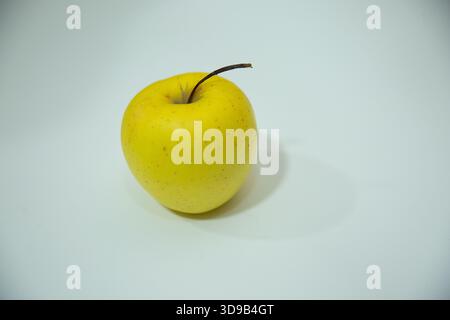 Pomme mouchetée simple avec ombre douce Banque D'Images