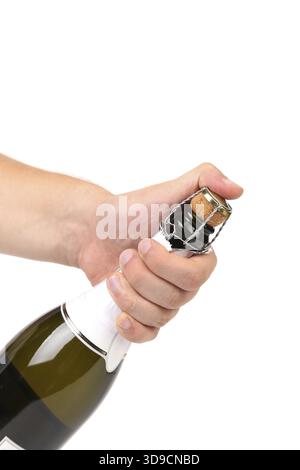 Main avec bouteille de champagne isolé sur un fond blanc Banque D'Images
