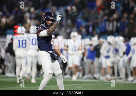 Charlotte, États-Unis d'Amérique. 06th Dec, 2025. Sécurité des cavaliers de Virginie Antonio Clary (0) célèbre une escale défensive au Bank of America Stadium à Charlotte, NC le 6 décembre 2025. (Photo de Jonathan Huff/Sipa USA) crédit : Sipa USA/Alamy Live News Banque D'Images