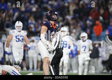 Charlotte, États-Unis d'Amérique. 06th Dec, 2025. Le linebacker James Jackson (1) des cavaliers de Virginie célèbre une escale défensive au Bank of America Stadium de Charlotte, NC, le 6 décembre 2025. (Photo de Jonathan Huff/Sipa USA) crédit : Sipa USA/Alamy Live News Banque D'Images