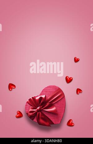 Boîte cadeau rouge avec ruban rouge sur le fond rose. Passion présente. Bonne Saint Valentin. Carte de voeux. Banque D'Images