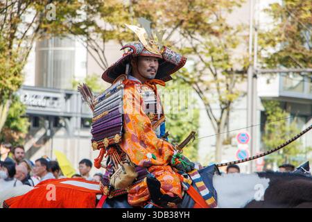 Japon - Kyoto - le cavalier vêtu d'un costume précis de guerrier samouraï à la procession du festival Jidai Matsuri également appelé la fête des âges, Banque D'Images