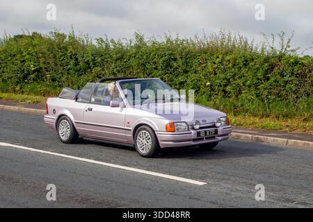 Années 1989 80 Amethyst Rose métallique Ford Escort Xr3i car Cabriolet essence 1597 cc, génération Mk4, 1.6L (1597cc) essence, cabriolet à injection de carburant, Banque D'Images