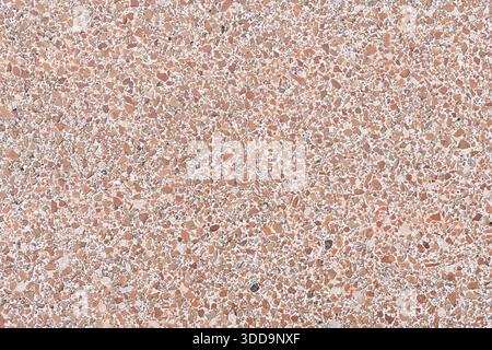 Vue haute résolution d'une texture d'agrégat sans couture avec de petits cailloux colorés. Fond de pierres minérales aux tons de terre pour l'architecture et l'intérieur Banque D'Images