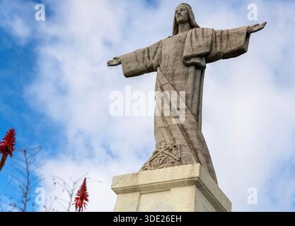 Statue du Christ Roi (Cristo Rei) également connue sous le nom de statue du Sacré-cœur, Garajau, Madère, Portugal Banque D'Images
