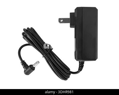 Alimentation noire avec prise murale de style US et câble de connecteur DC, fournissant de l'électricité à l'équipement électronique. Isolé Banque D'Images