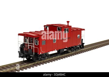Un caboose de chemin de fer rouge garé sur la voie ferrée. Banque D'Images