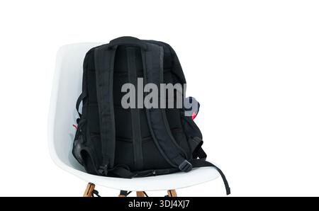 Sac à dos quotidien pour ordinateur portable et voyage. Concept de se préparer pour l'école, l'université ou le bureau. Intérieur minimaliste et préparation au voyage Banque D'Images