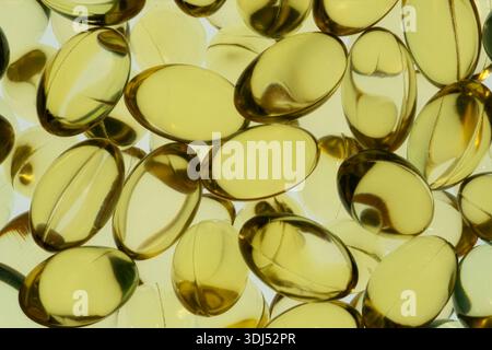 Gros plan des vitamines de chapeau de gel d'or Banque D'Images