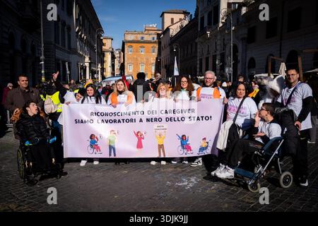 Rome, RM, Italie. 27 janvier 2026. Rome : les associations d'aidants familiaux se rassemblent pour la reconnaissance des droits des personnes handicapées et de leurs aidants, et contre le projet de loi Locatelli. (Crédit image : © Marco Di Gianvito/ZUMA Press Wire) USAGE ÉDITORIAL SEULEMENT ! Non destiné à UN USAGE commercial ! Banque D'Images