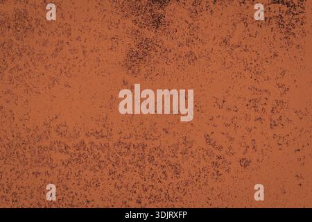 Vue rapprochée d'une surface métallique rouillée brun rougeâtre avec une apparence texturée et altérée. Banque D'Images