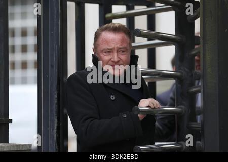 Michael Flatley leaving Belfast High Court, after a legal order blocking him from engaging with the Lord of the Dance production has been overturned by a court in Belfast. At The Chancery Court in the Royal Courts of Justice on Thursday, Mr Justice Simpson discharged a temporary injunction that had been secured against the dancer and choreographer. Picture date: Thursday January 29, 2026. Banque D'Images