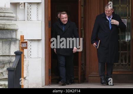 Michael Flatley (left) leaving Belfast High Court, after a legal order blocking him from engaging with the Lord of the Dance production has been overturned. At The Chancery Court in the Royal Courts of Justice on Thursday, Mr Justice Simpson discharged a temporary injunction that had been secured against the dancer and choreographer. Picture date: Thursday January 29, 2026. Banque D'Images