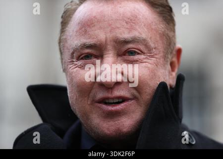Michael Flatley speaking to members of the media outside Belfast High Court, after a legal order blocking him from engaging with the Lord of the Dance production has been overturned. At The Chancery Court in the Royal Courts of Justice on Thursday, Mr Justice Simpson discharged a temporary injunction that had been secured against the dancer and choreographer. Picture date: Thursday January 29, 2026. Banque D'Images