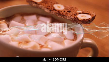 Montrant tasse en céramique avec cacao chaud, guimauves et biscotti sur la table en bois, superposition de forme d'onde Banque D'Images