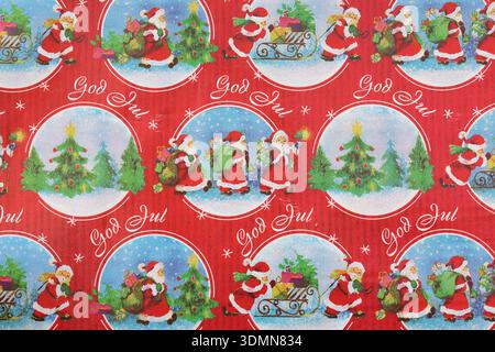 Papier cadeau de Noël. Pour emballer dans des paquets pour Noël. Texte suédois God jul. Joyeux Noël. Banque D'Images