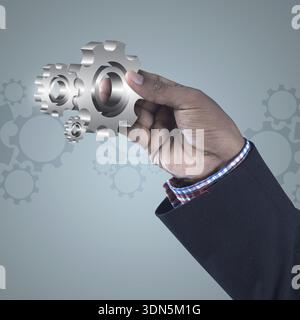 Homme assis sur le globe avec l'ordinateur portable. Au sommet du monde Banque D'Images