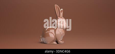 Lapin de Pâques en chocolat sur fond brun avec espace de copie pour le texte. Banque D'Images