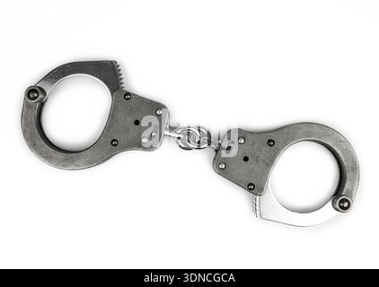 menottes policières sur blanc Banque D'Images